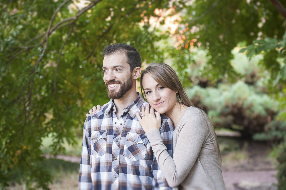 Portrait of the engaged couple during their engagement session in the Sculpture Garden at Monmouth University.